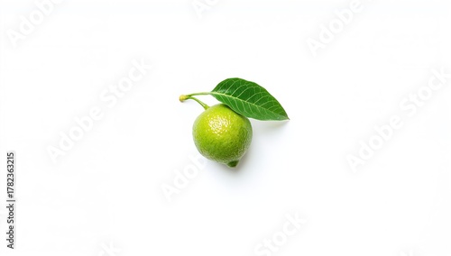 Lime placed against a white...