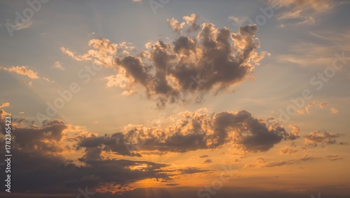 Golden sky with sunset clou...