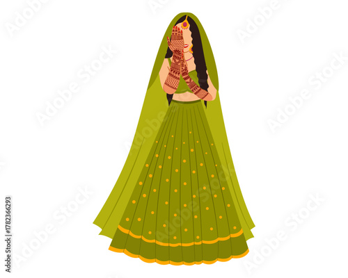 Indian bride for mehendi ceremony showing designs on hand celebrating haldi mehndi function bride to be