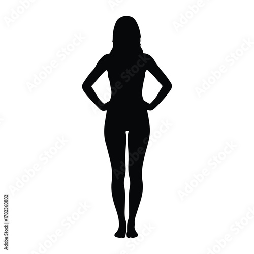 Silhouette of a woman standing with hands on hips female
