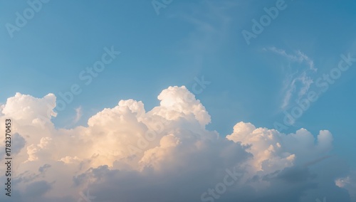 Blue sky filled with fluffy...