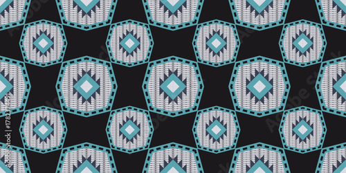 Geometric tribal pattern featuring octagonal shapes in green and black, seamless, octagon, woven mat texture, textile design, fabric print