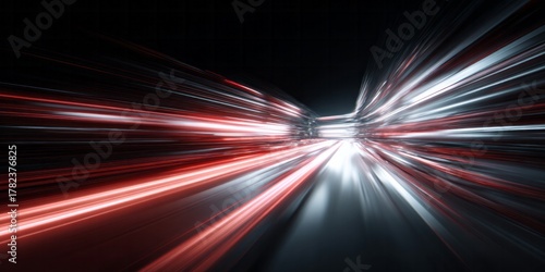 Intense speed movement captured through streaking red and white illumination trails against a dark background