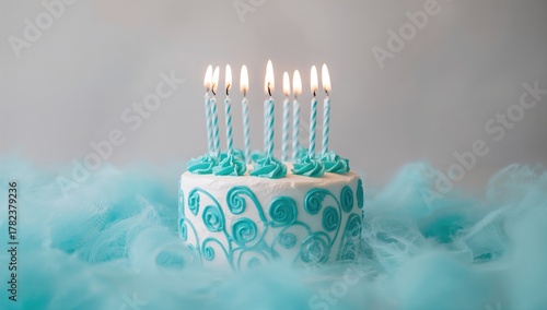 Blue birthday cake adorned ...