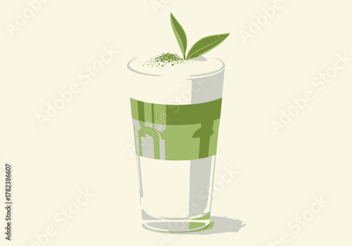 Refreshing iced matcha latte with foamy top and green leaves garnish in a tall glass