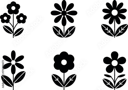Black and white floral pattern featuring stylized flowers with stems and leaves in a simple graphic design style