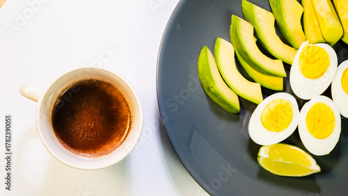 cup of coffee with lemon