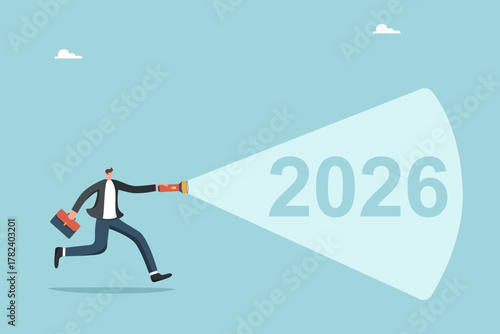 Strategic planning of actions in the new 2026, setting business goals to achieve heights, vision for future development of business or career in 2026, man runs with a flashlight towards 2026.