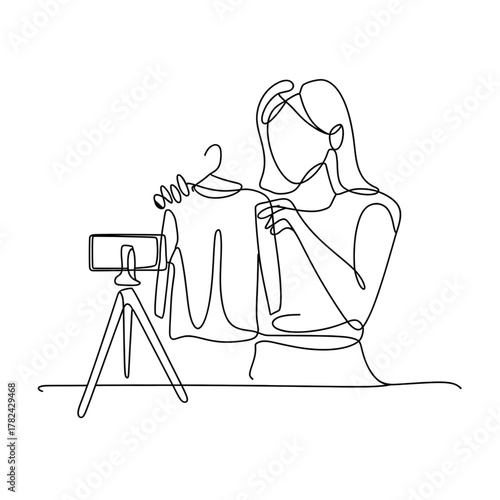 A stylish girl live streaming with smartphone wearing elegant dress