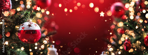 Christmas Tree with Illuminated Lights. Glittering Christmas Tree with Garlands and Decorations. Red Background