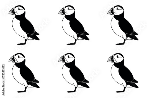 Seamless pattern of atlantic puffins in black and white standing on a white background creating a simple design