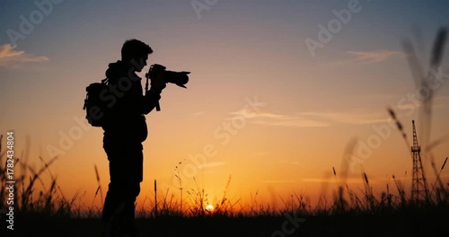 silhouette of a man with a backpack