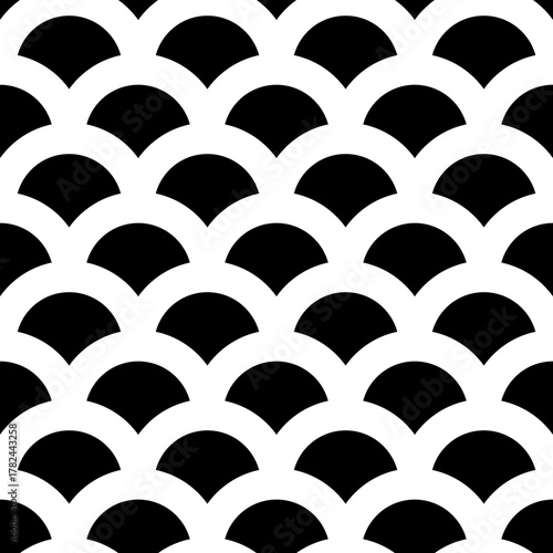 Fish scale wallpaper. Asian traditional ethnic ornament with repeated scallops. Repeated black scallop on white background. Seamless surface pattern design with scales. Squama motif. Digital paper.