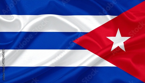 Free Download Cuban national flag with blue and white stripes, red triangle, and white star on flagpole. - GFXLoad