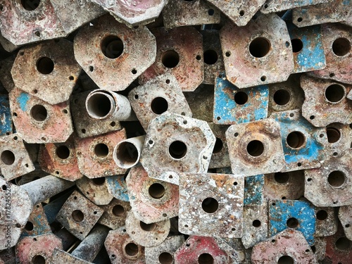 Metal legs of the construction scaffolding  close-up shot. Texture photo