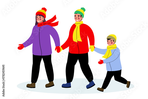 Family enjoys a winter walk together dressed warmly in colorful clothes during a snowy day