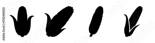 Four black silhouette corn cobs on a