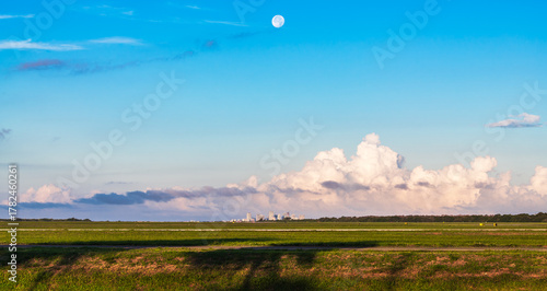Skyline on the horizon, moon above