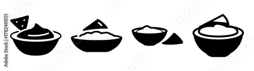 Collection of four black and white icons depicting bowls of dip or guacamole with tortilla chips, isolated on a
