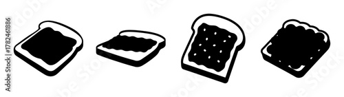 Four slices of toast with jam spread on them