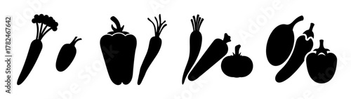 Collection of black silhouette icons of various vegetables including carrots, bell peppers, chili peppers, and a pumpkin, isolated on a