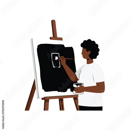 A person paints a design on a canvas with a brush, holding paint, canvas stands in an easel
