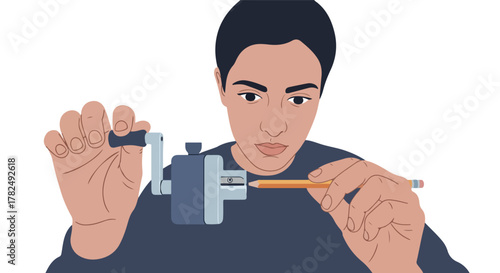 A person sharpening a pencil with a mechanical sharpener, focused