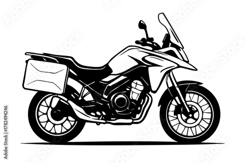 modern adventure touring motorcycle with panniers and tall windshield