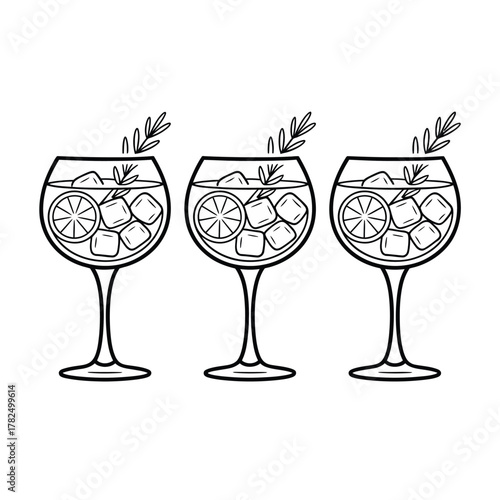 Three refreshing gin and tonic cocktails with ice and lime slices