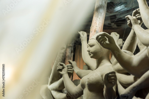 Goddess idols are being prepared with clay before festival. Idols being made for Durga Puja festival.
