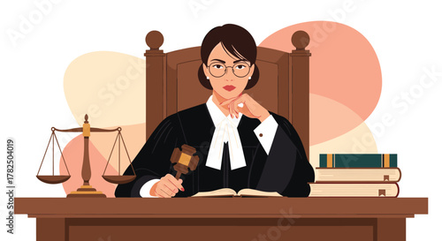 A female judge in her robes sits at her desk holding a gavel.