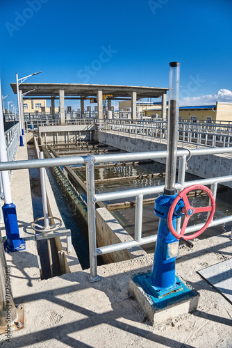 Wastewater treatment plant valve actuator. Manual flow control with visual position indicator.