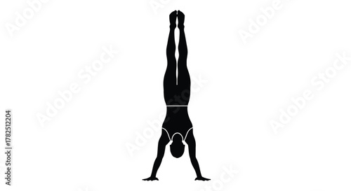 Silhouette of a female gymnast performing a perfect handstand, showcasing strength and control