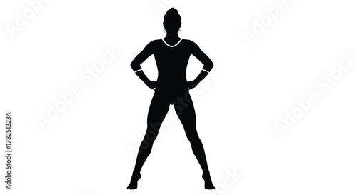 Silhouette of a confident woman standing with hands on hips strong female figure in a power pose