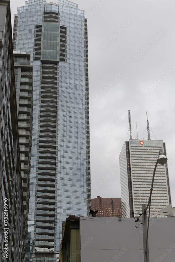 Obraz premium looking east on Lane North Adelaide East Duncan to Shangri-La Hotel tower and First Canadian Place, BMO, Bank of Montreal from Duncan St, Toronto