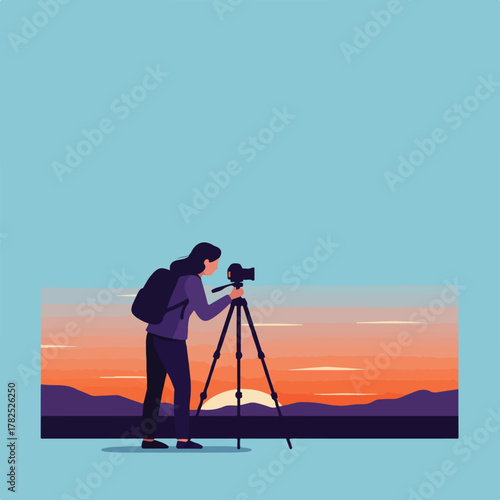 A photographer with a backpack, captures a sunset landscape using a tripod-mounted camera, against a blue backdrop