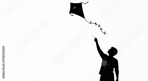 Joyful silhouette of a person flying a kite against a bright sky