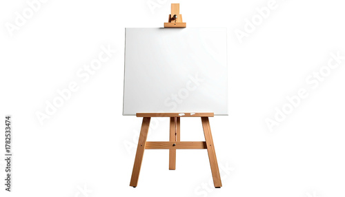 Wooden easel holding a blank, white canvas; centered on a black background