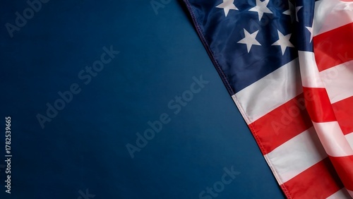 The Corner Section of the United States of America Flag Displayed Diagonally Against a Solid, Deep Navy Blue Background, Providing Ample Copy Space for Patriotic and Political Themes