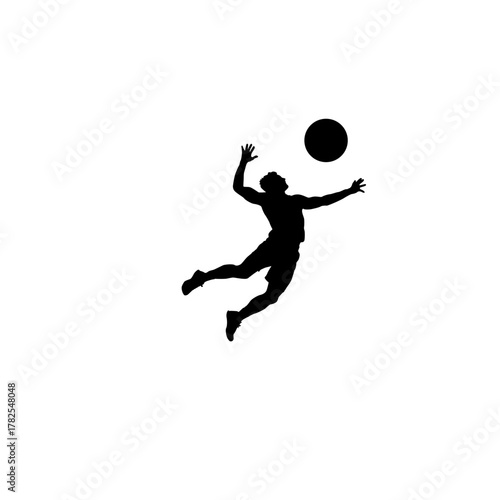 Silhouette of a volleyball player jumping and spiking the ball during a game