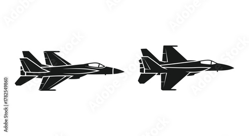 Two black silhouette fighter jets shown in side profile views