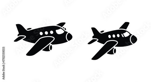 Simple black and white illustration of two cartoon airplanes in flight