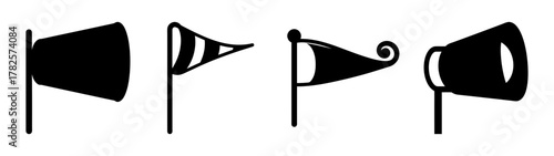 Set of four stylized black wind sock and flag icons indicating wind direction and strength