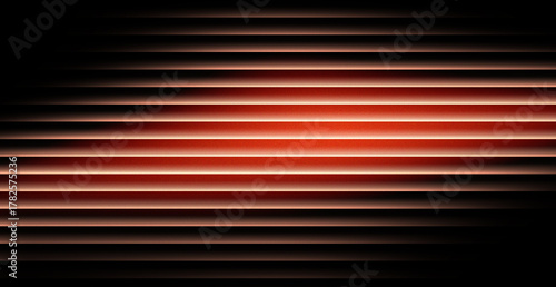 Dramatic light shines through window blinds creating a modern and intriguing abstract pattern perfect for backgrounds or artistic design projects