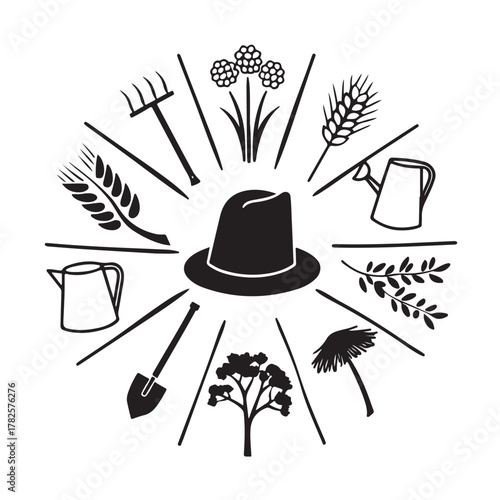 Vintage farming and gardening tools arranged around a black hat