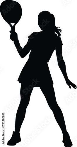 Silhouette of a female tennis player in action holding a racket ready to serve on a white background