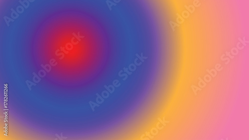 Concentric color circle on pink background: vivid red center with blue and yellow halo for design and branding

