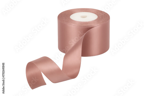 Pink satin ribbon spool unwinding for decoration