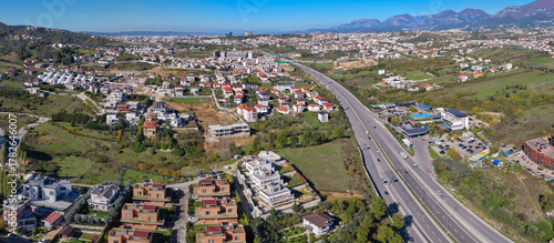 Tablou pe pânză Aerial panorama of Tirana’s eastern suburbs showing the Tirana–Elbasan highway and developing Sauk–Farkë residential areas