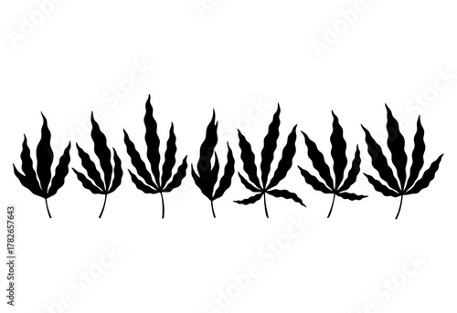 Set of black cannabis leaf silhouettes in various shapes